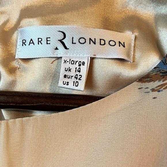 Feathered and cream loose A-line dress perfect for belting or wearing loose. - Picture 3 of 4